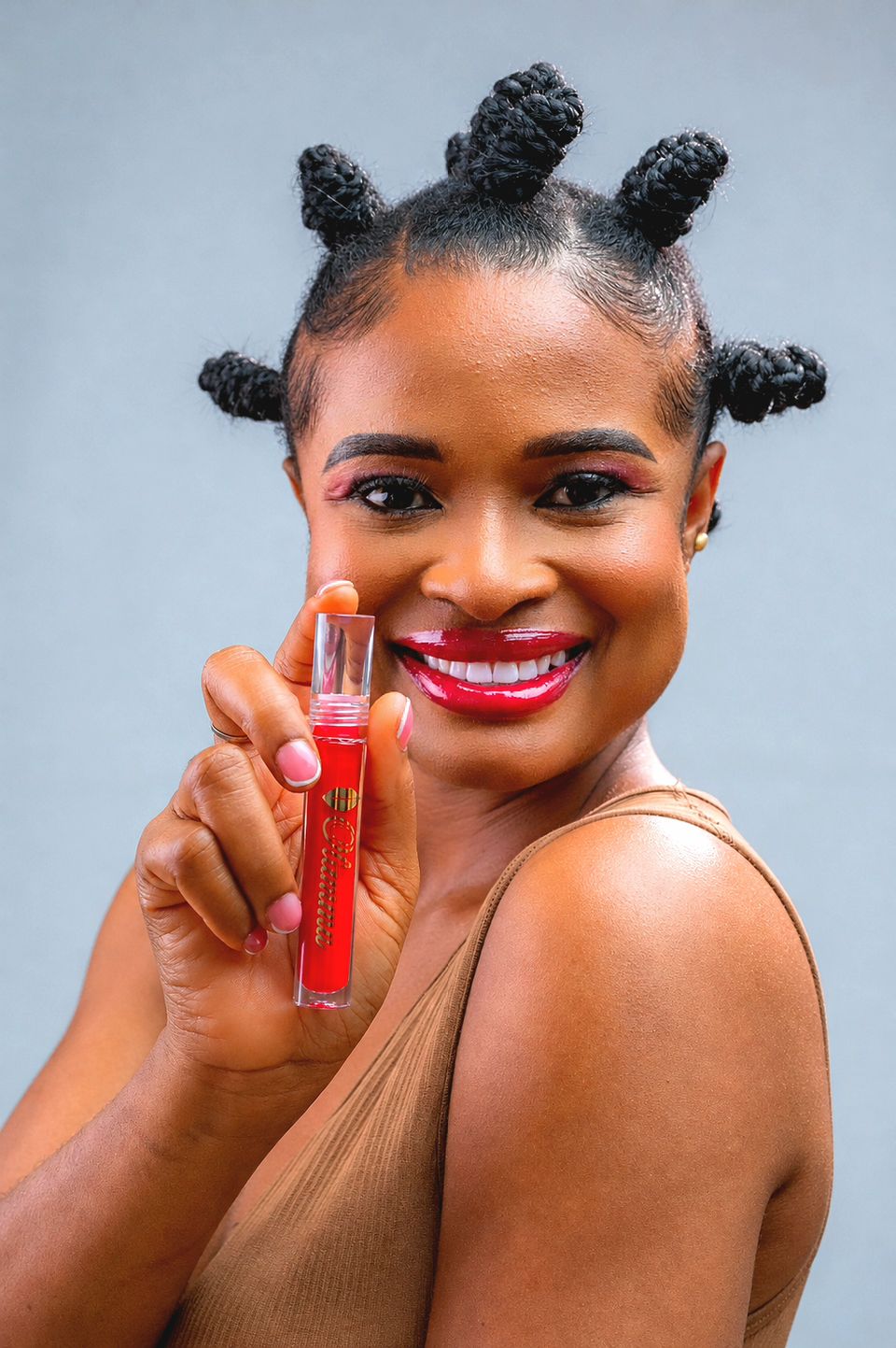 Smiling model wearing Ugo red gloss